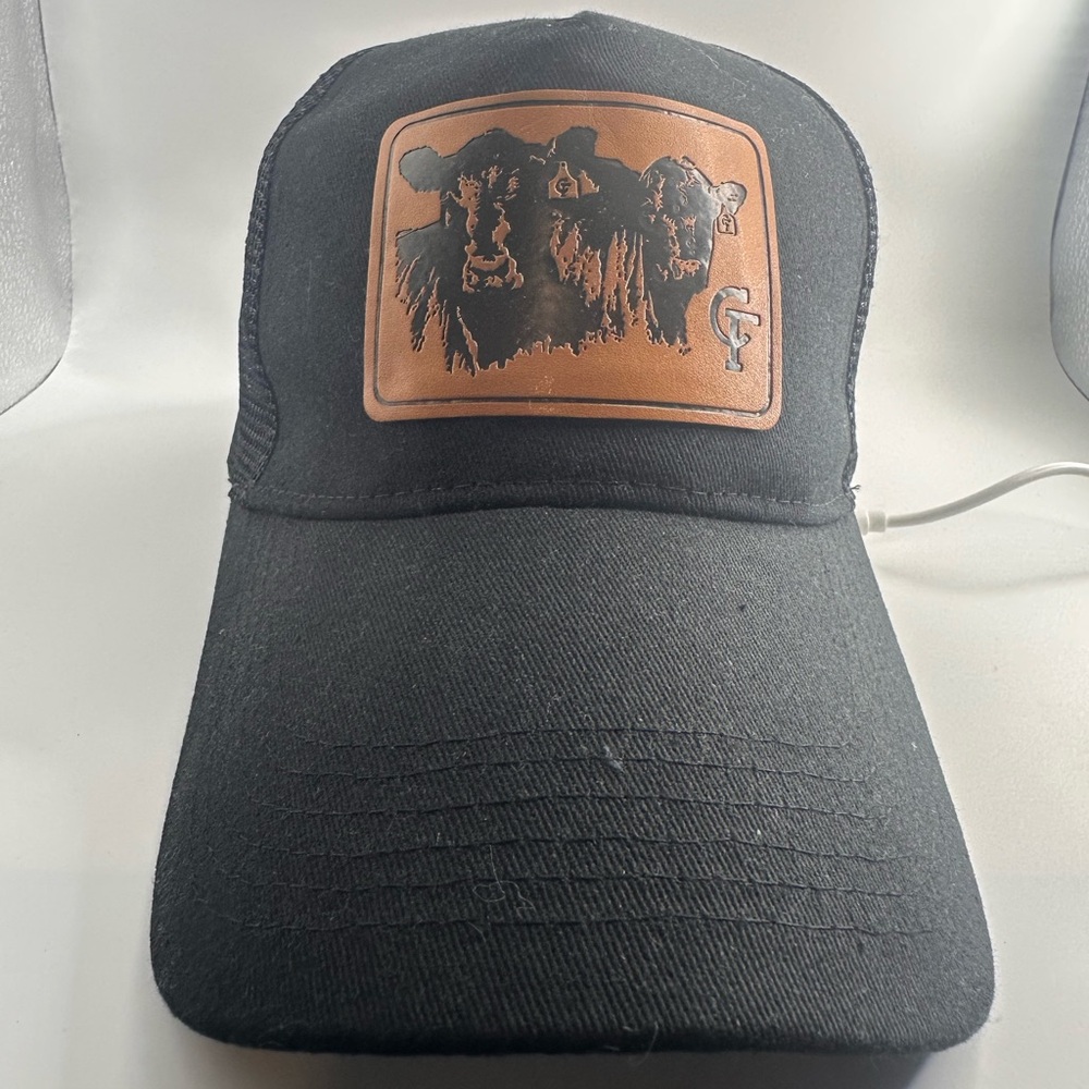 Black Trucker Hat with Cow Graphic Patch